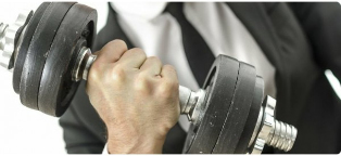 a man holds dumbbell